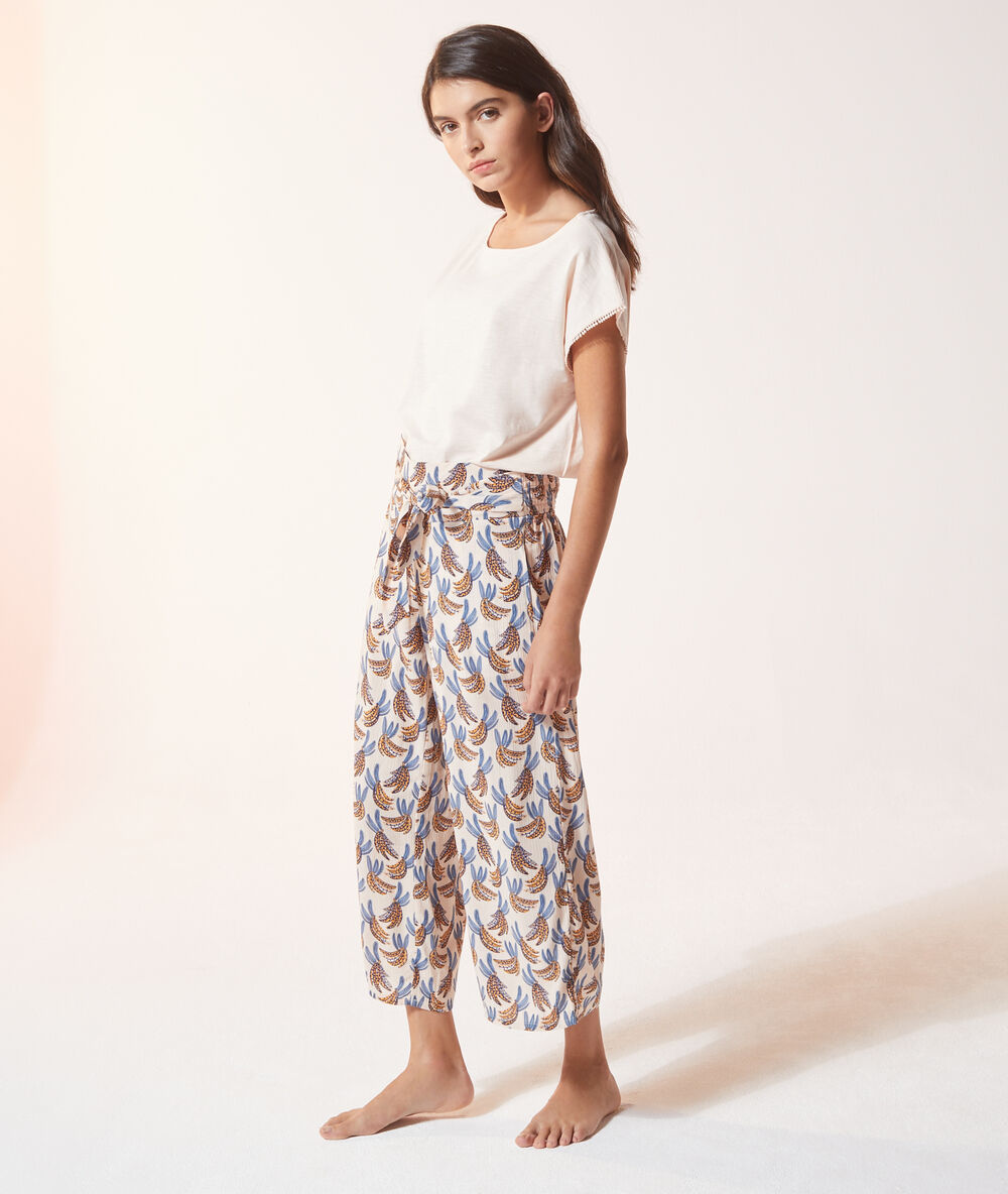 Pantalón 7/8 estampado tropical rosa.