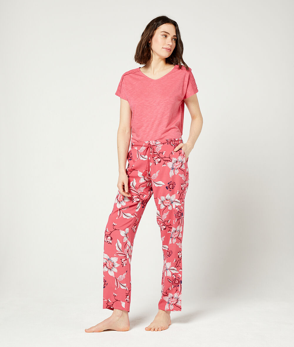 Pantalón estampado floral coral.