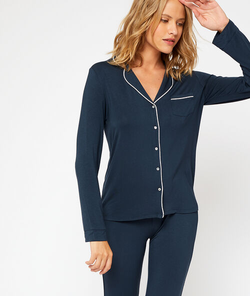 Camisa pijama turquesa.