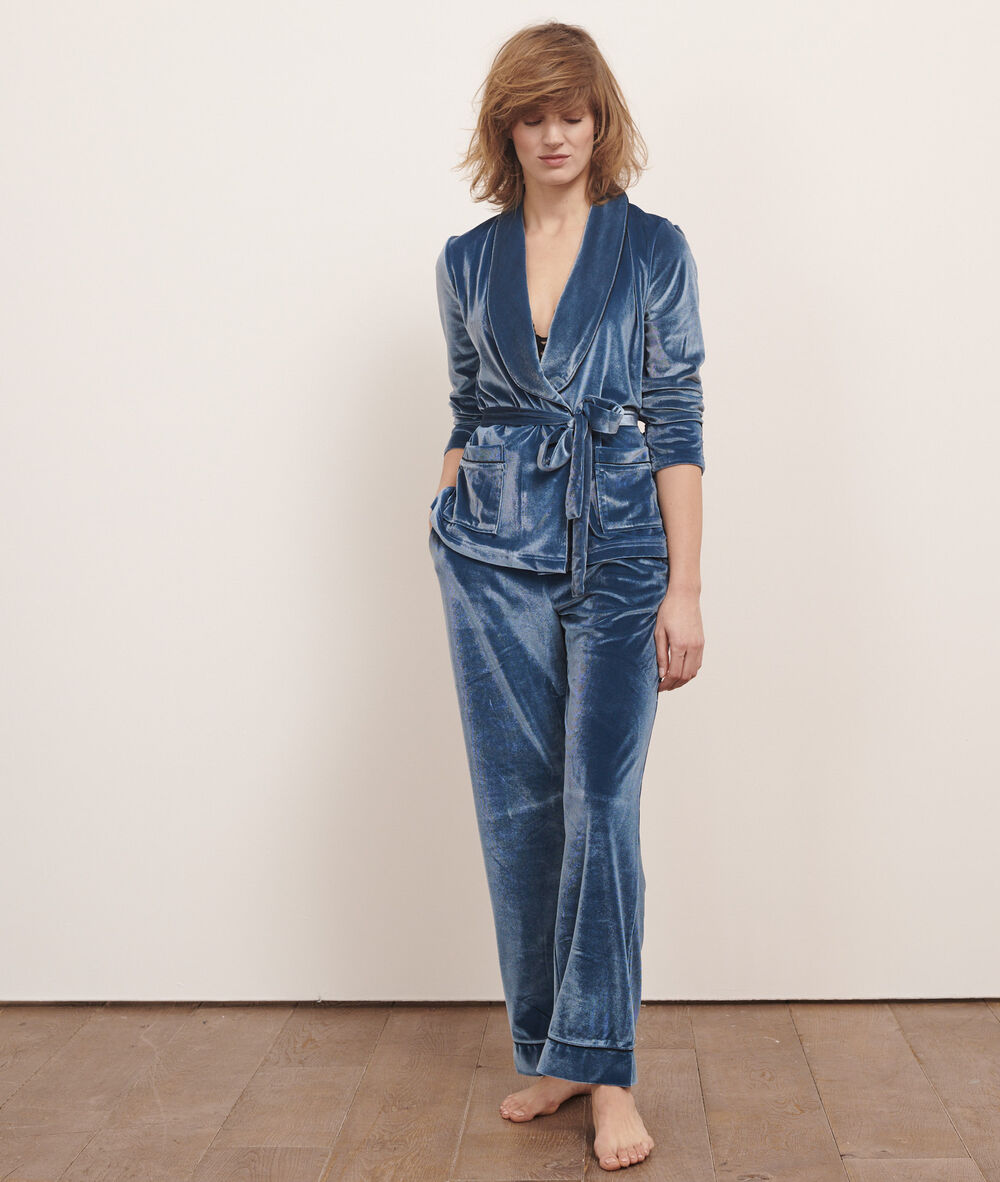 Pantalon en velours bleu petrole.