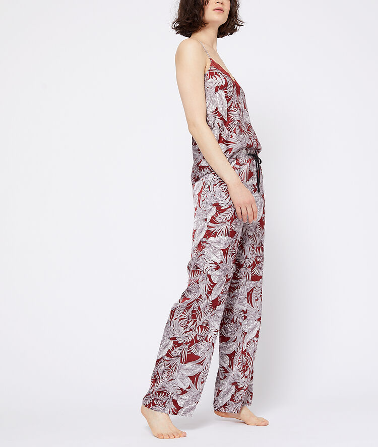 Pantalón estampado de hojas teja.