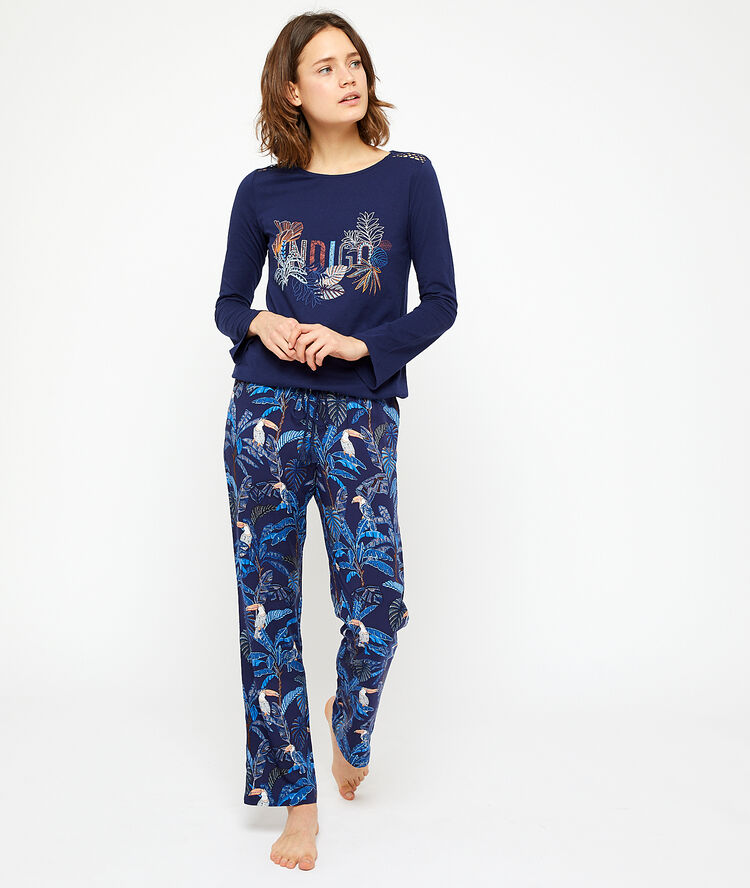 Pantalón estampado tropical azul marino.