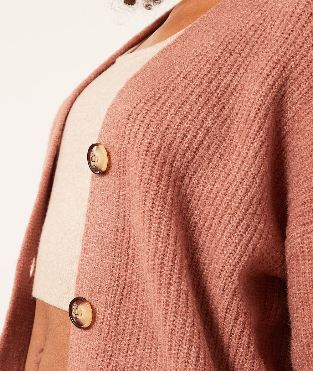 Chaqueta de punto terracota.