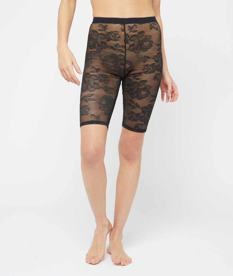Leggings de encaje floral negro.
