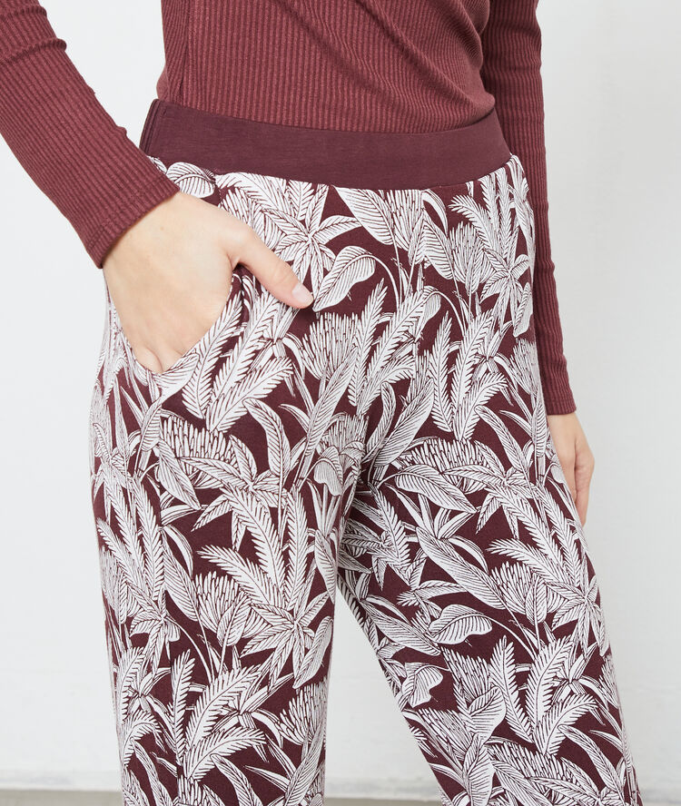 Pantalón estampado hojas marrón.