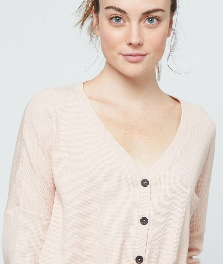 Camiseta manga larga de algodón rosa.