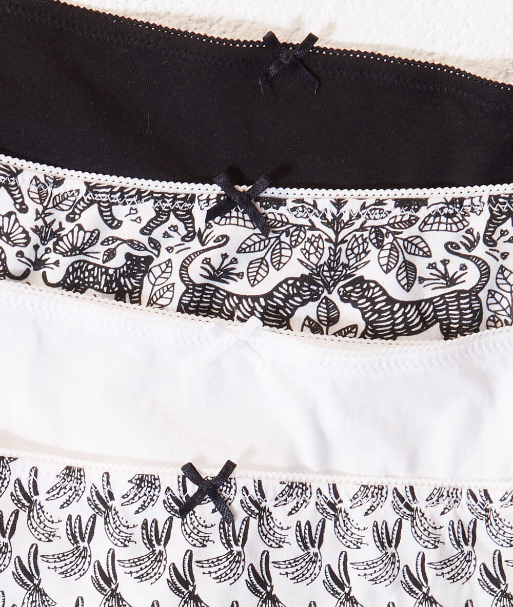 Lote de 4 tangas estampados negro.