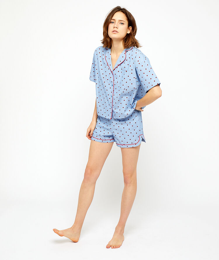 Camisa manga corta estampado de lunares azul.