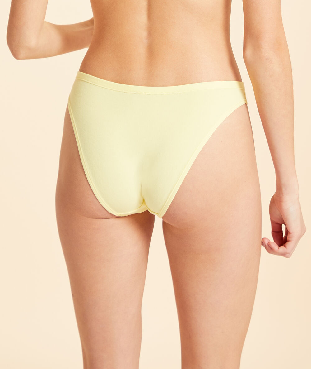 Braguita pierna alta de algodón amarillo ácido.