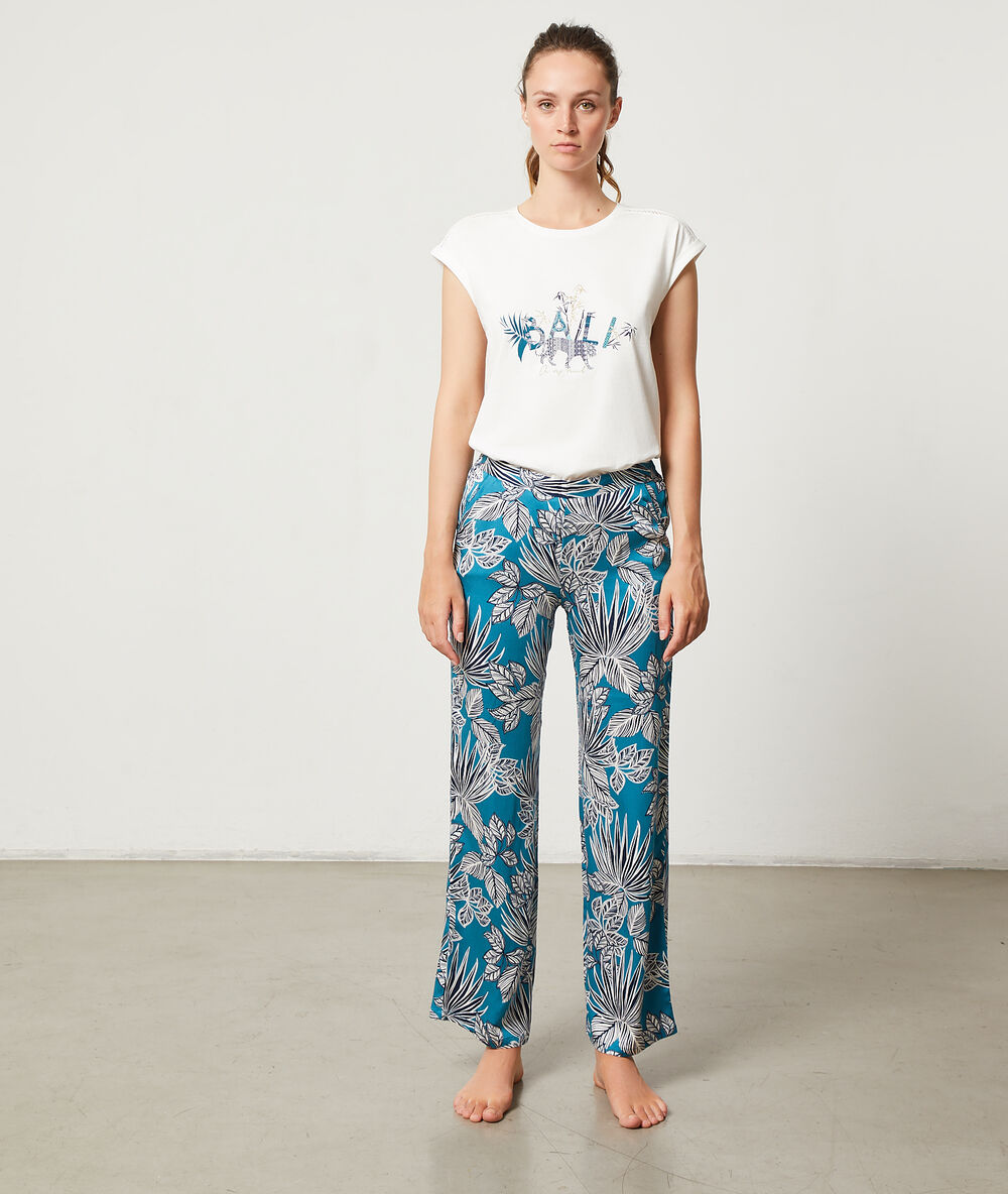 Pantalón estampado tropical turquesa.