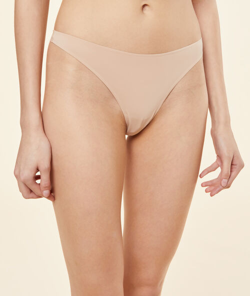 Tanga de microfibra y tul piel.