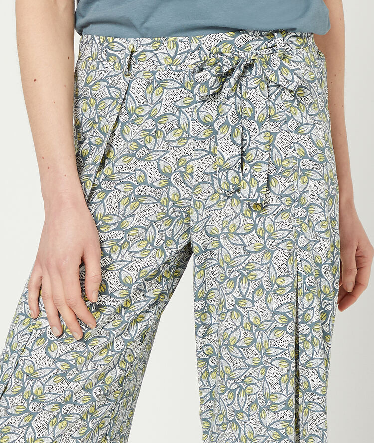 Pantalón estampado hojas caqui.