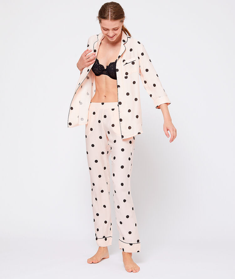 Camisa pijama estampado de lunares rosa.
