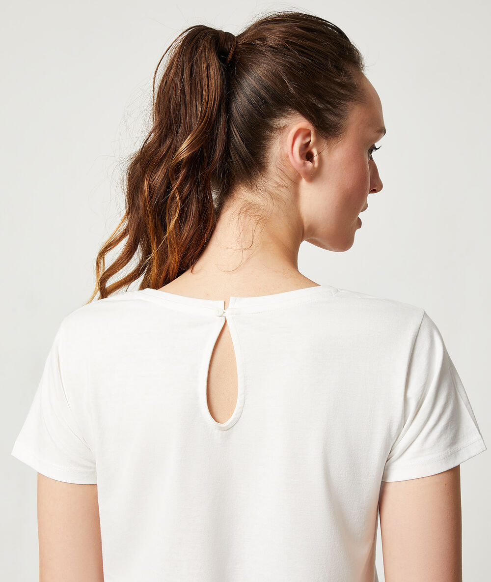 Top estampado crudo.
