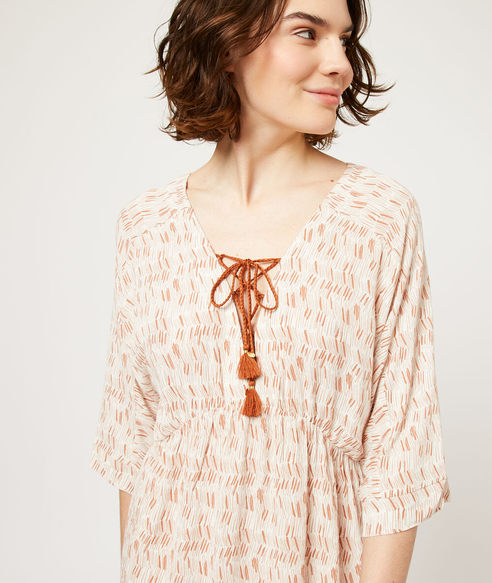 Camisón estampado con pompones terracota.