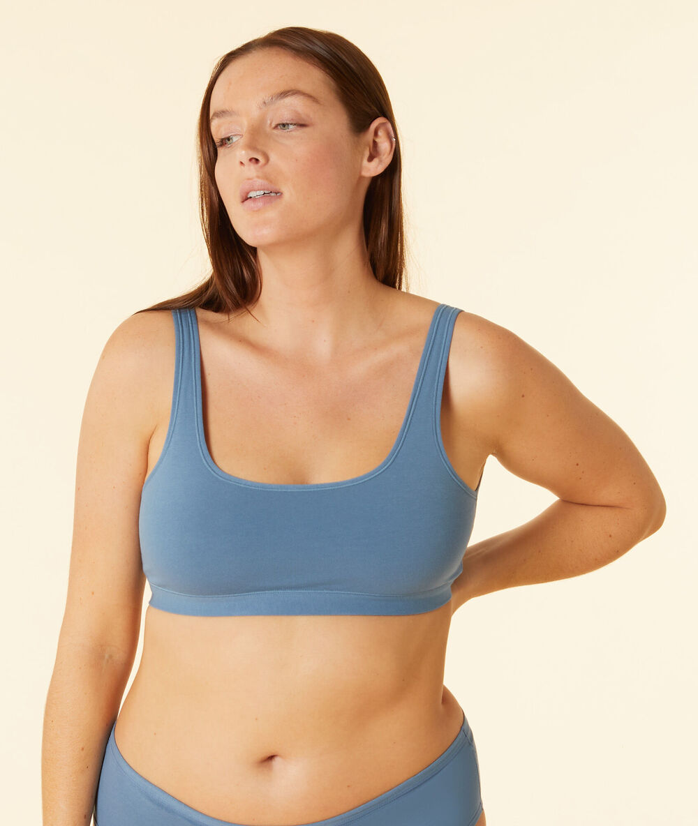 Top reversible de algodón azul.