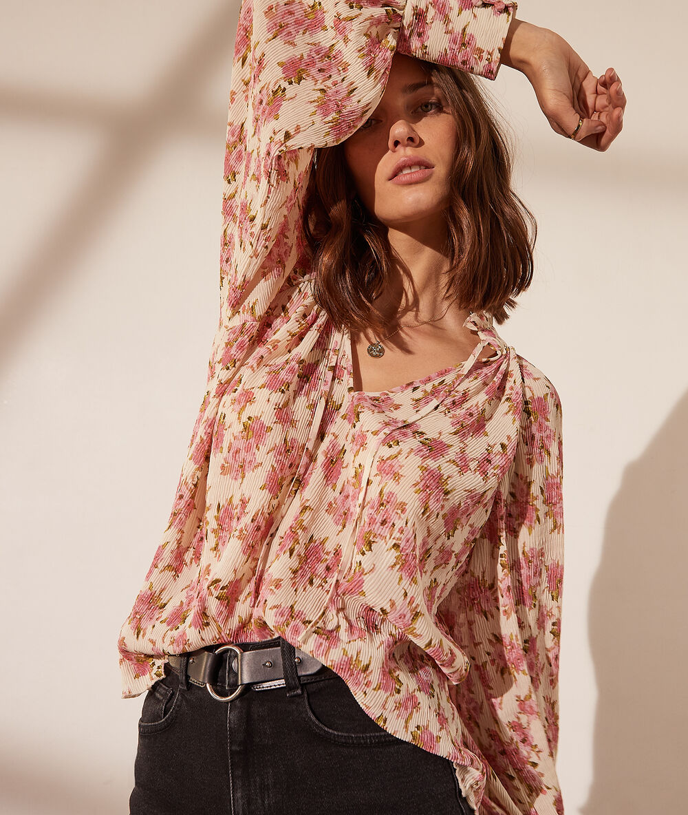 Blusa estampado floral crudo.