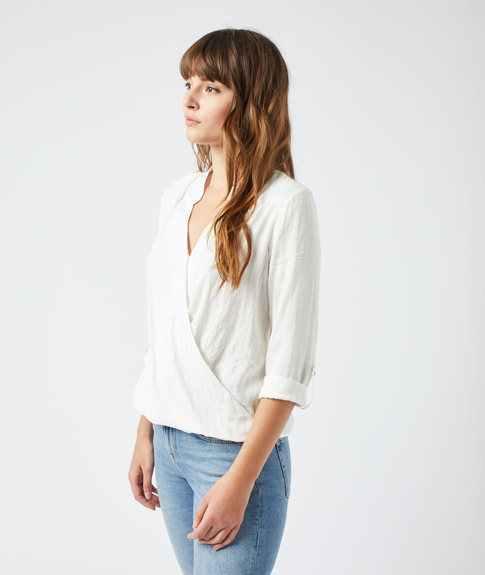 Blusa escote cruzado crudo.