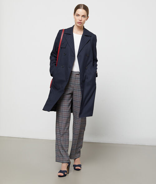 Pantalón estampado de cuadros negro.