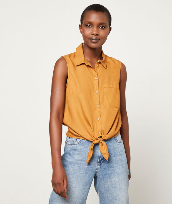 Camisa sin mangas con lazada Camisa sin mangas con lazada