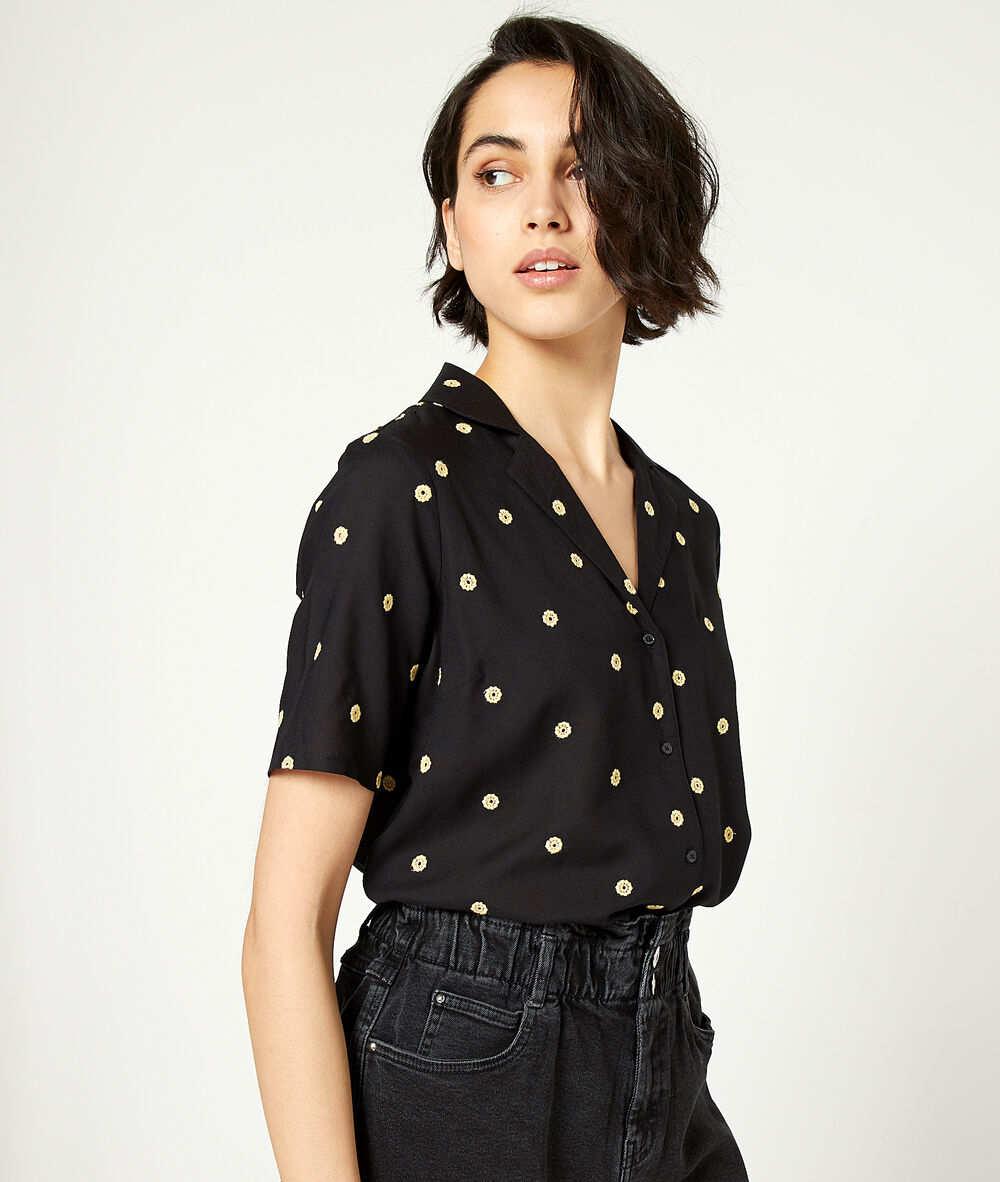 Blusa estampado de topos negro.