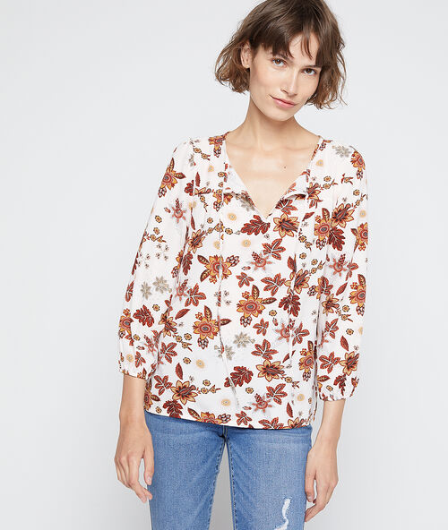 Blusa estampado floral crudo.