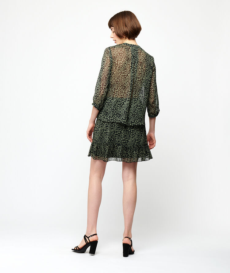 Blusa transparente estampada negro.