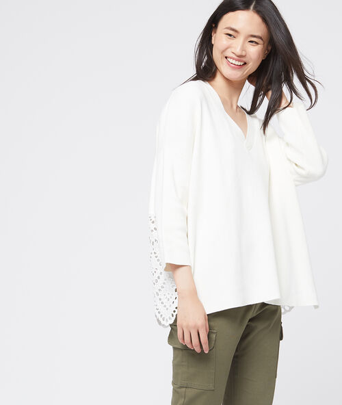 Su&eacute;ter de algod&oacute;n con bordados crudo.