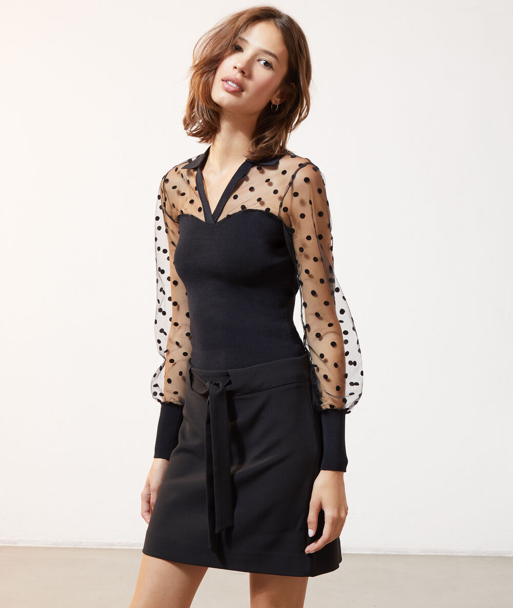 Top mangas transparentes tul plumeti negro.