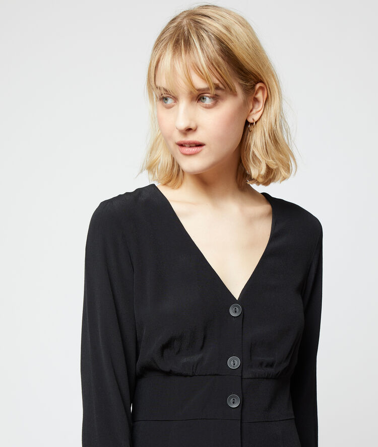 Vestido vaporoso abotonado negro.