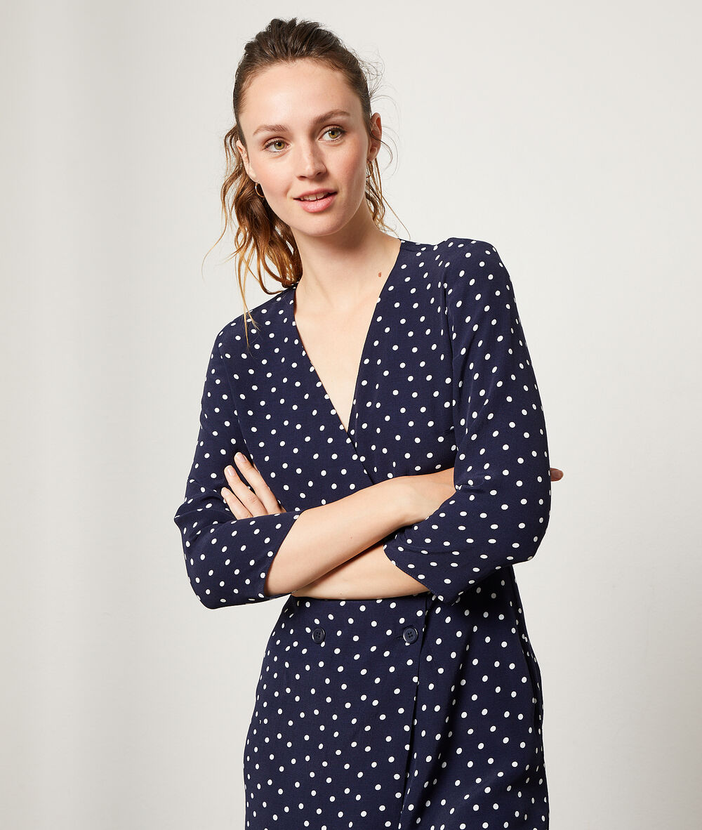 Vestido estampado de lunares azul marino.