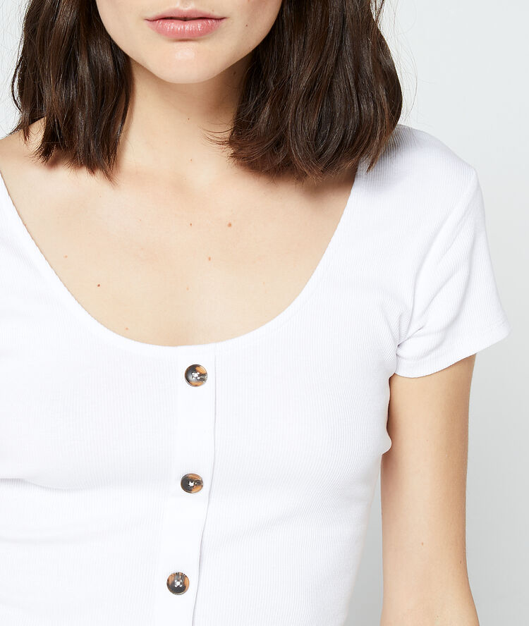 Camiseta abotonada de algodón orgánico blanco.