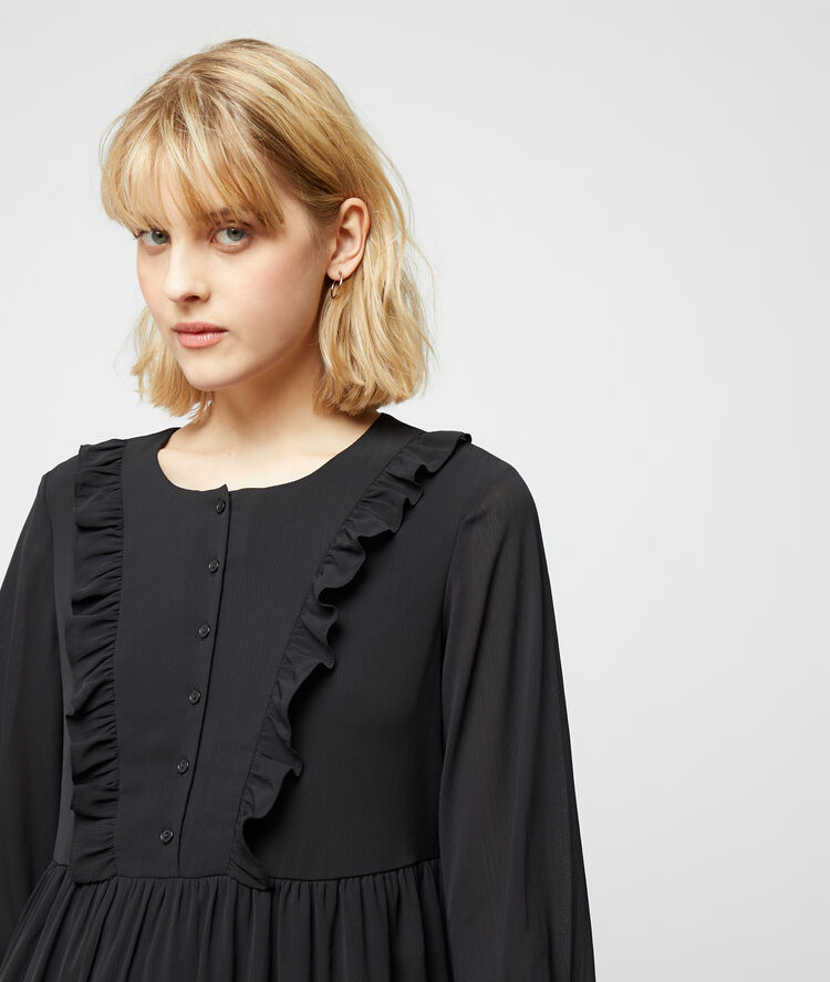 Vestido vaporoso de volantes negro.