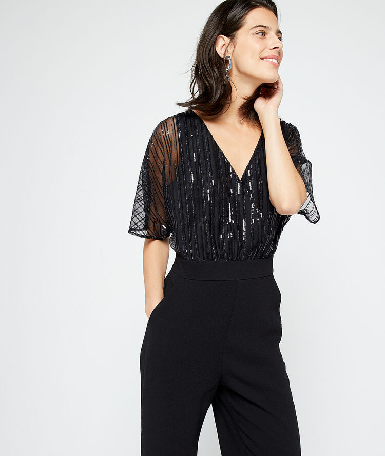 Mono cruzado con lentejuelas negro.