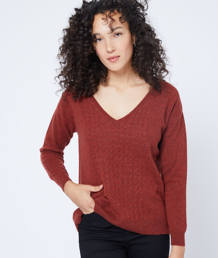 Suéter con cuello vuelto de cachemira rojo.