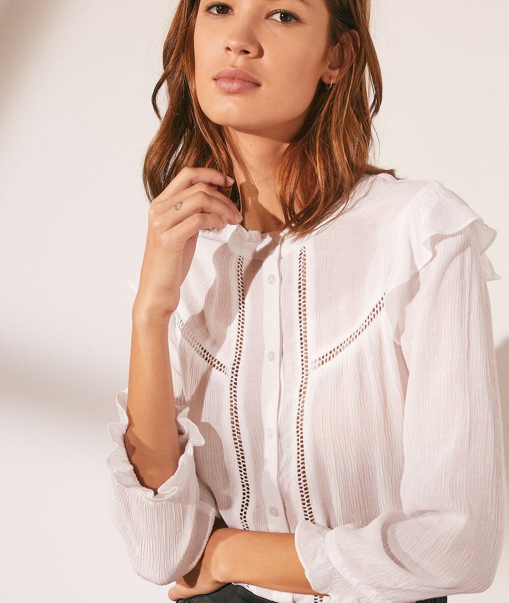 Camisa con volantes crudo.