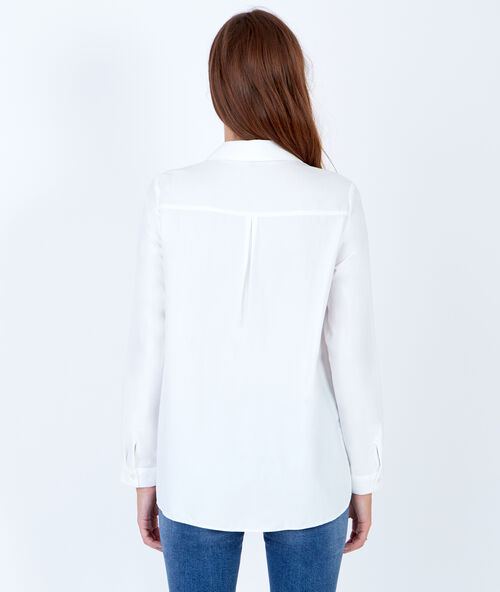 Camisa de manga larga blanco.