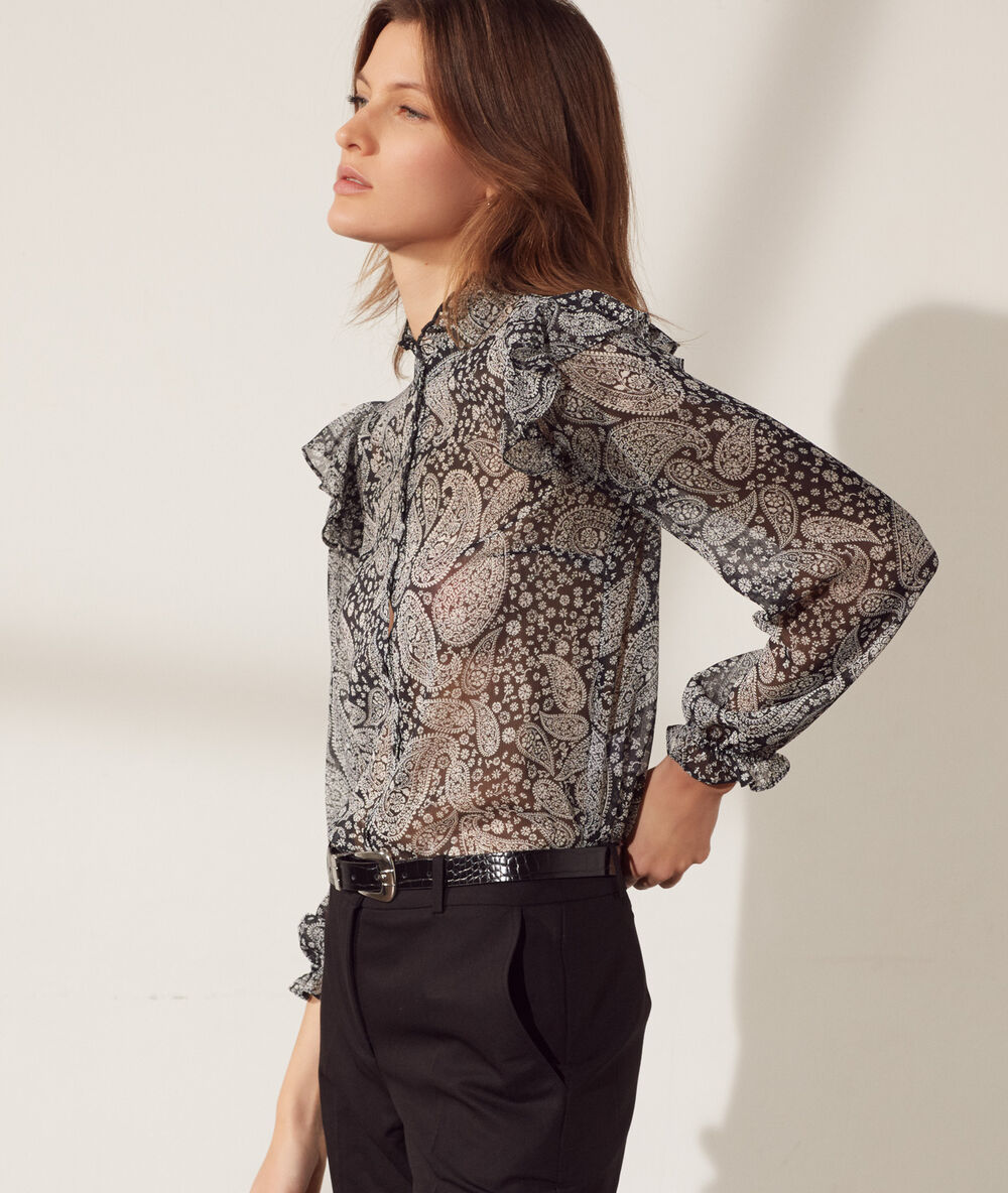 Camisa transparente negro.