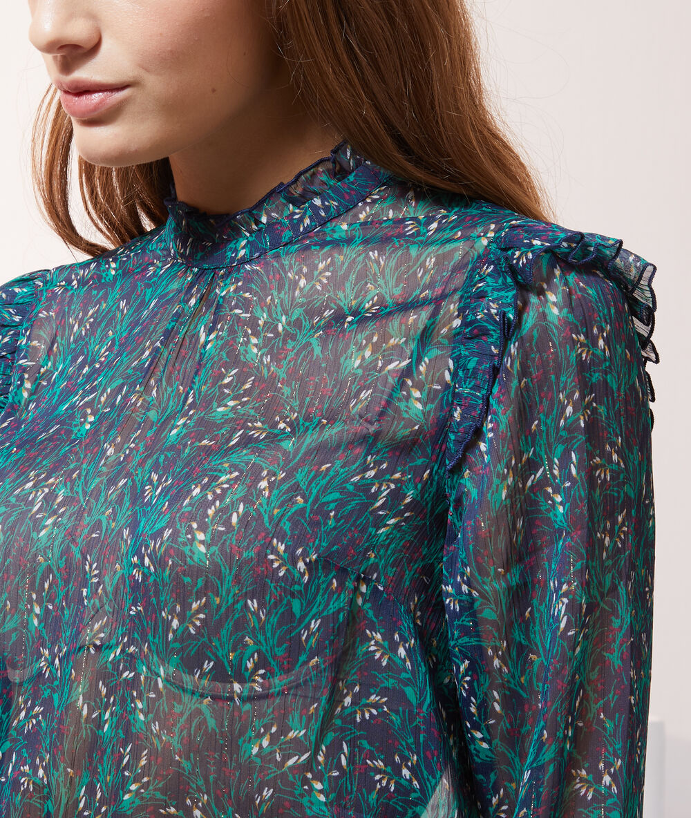 Blusa ligera estampada verde.