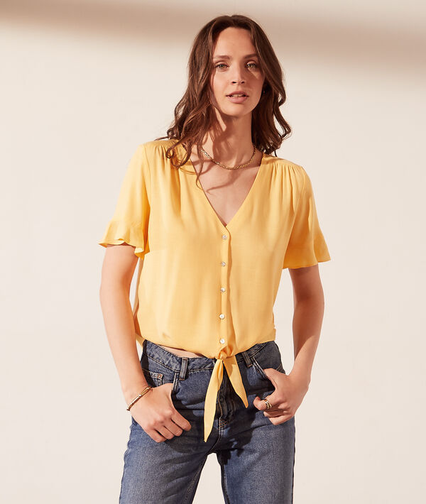 Blusa corta con lazada Blusa corta con lazada