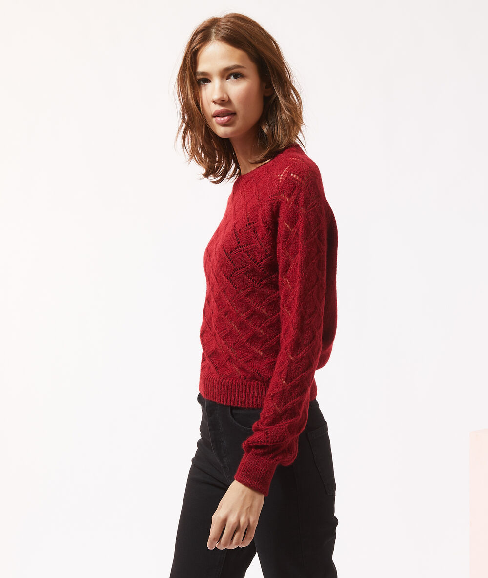 Pull maille pointelle rouge.