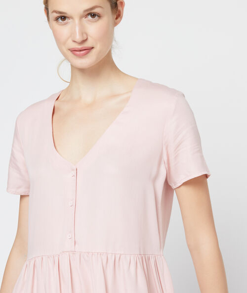 Vestido acampanado de tencel rosa pálido.