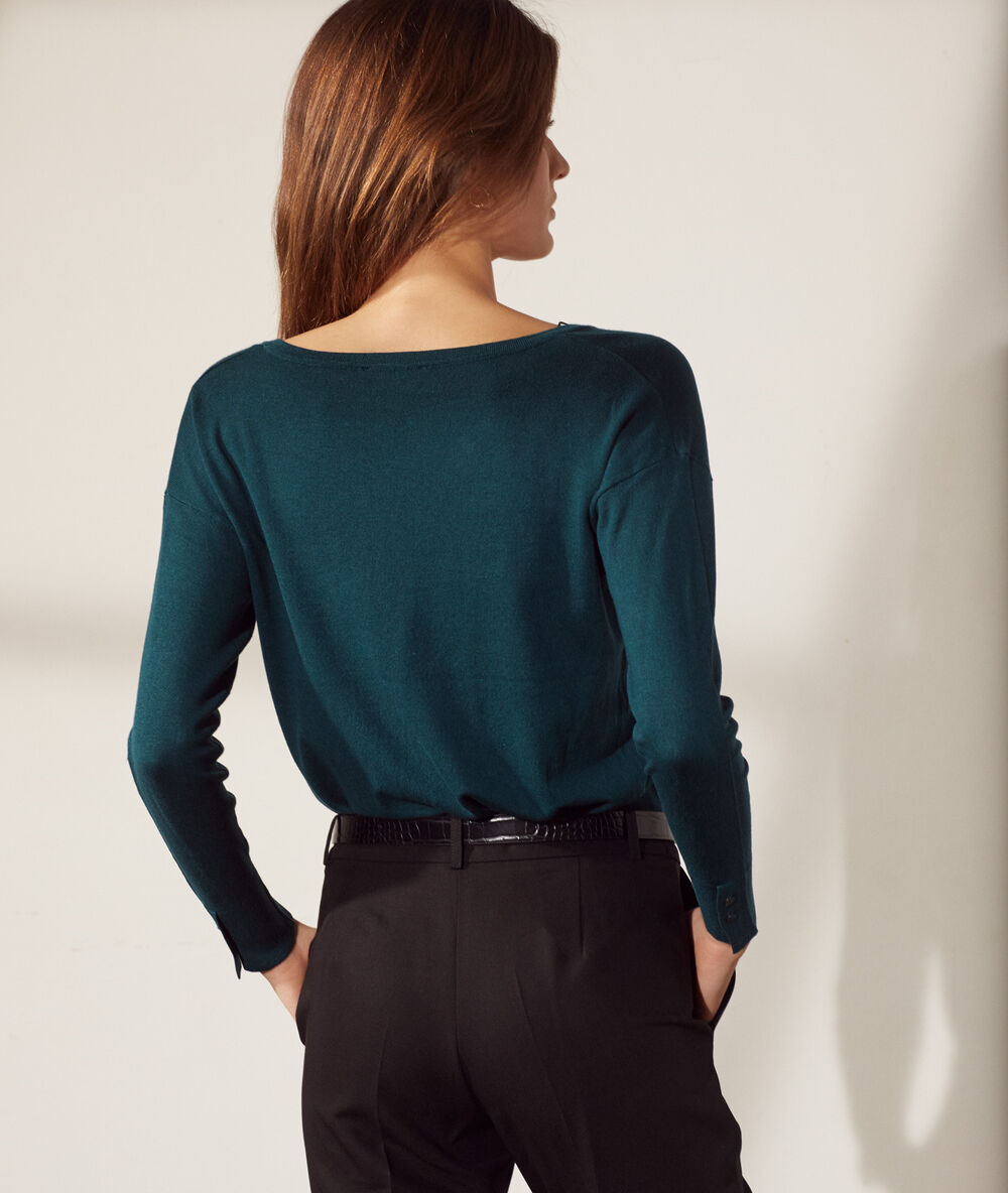 Jersey de punto fino verde pavo.