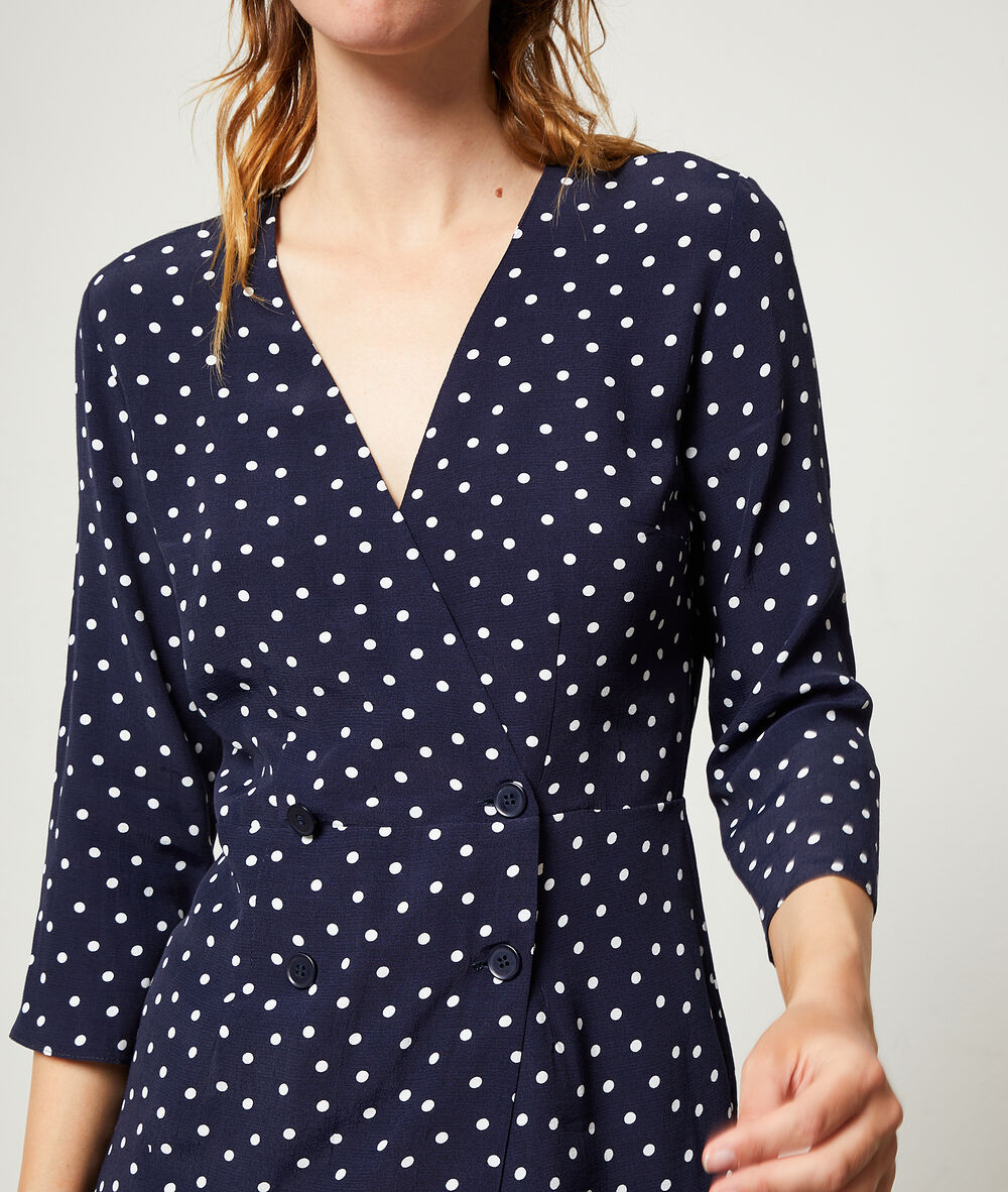 Vestido estampado de lunares azul marino.
