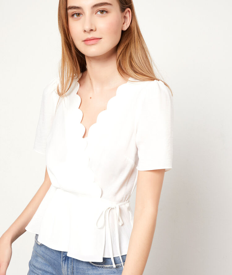 Blusa escote cruzado crudo.