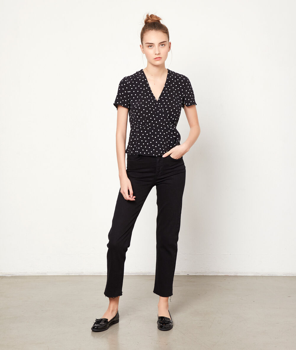 Blusa escote cruzado estampado lunares negro.