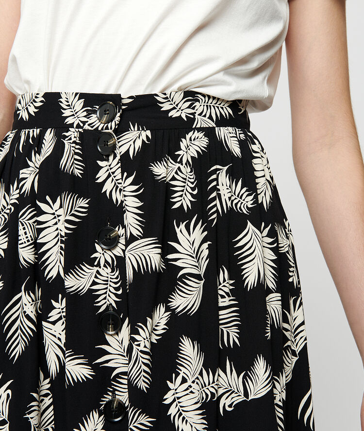 Falda larga estampado hojas negro.