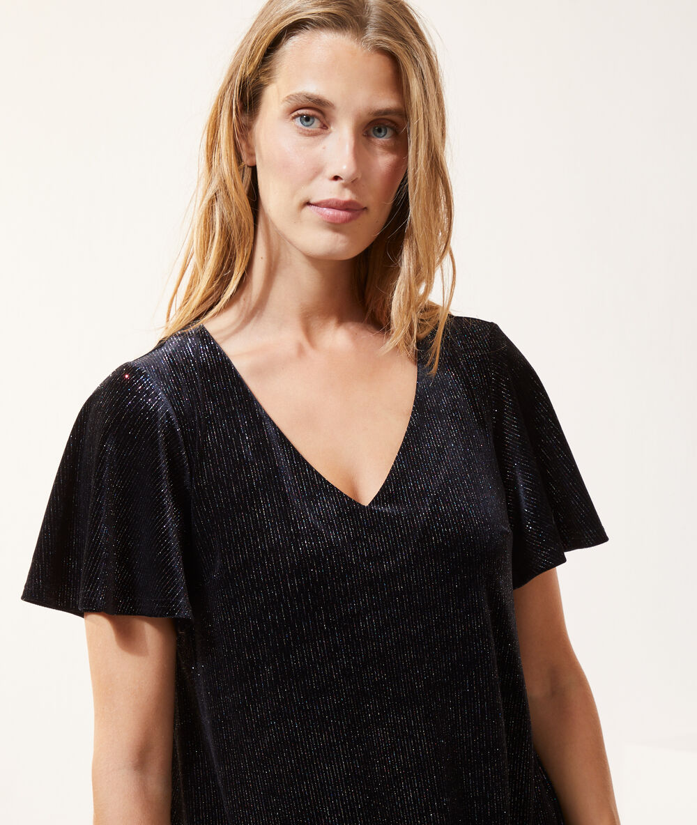 Vestido recto con lentejuelas negro.