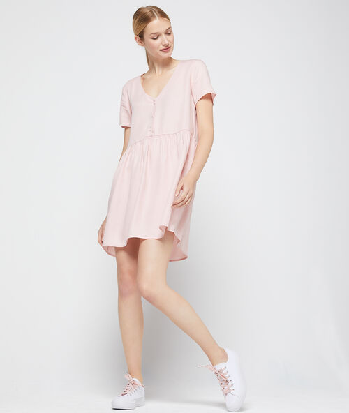 Vestido acampanado de tencel rosa pálido.