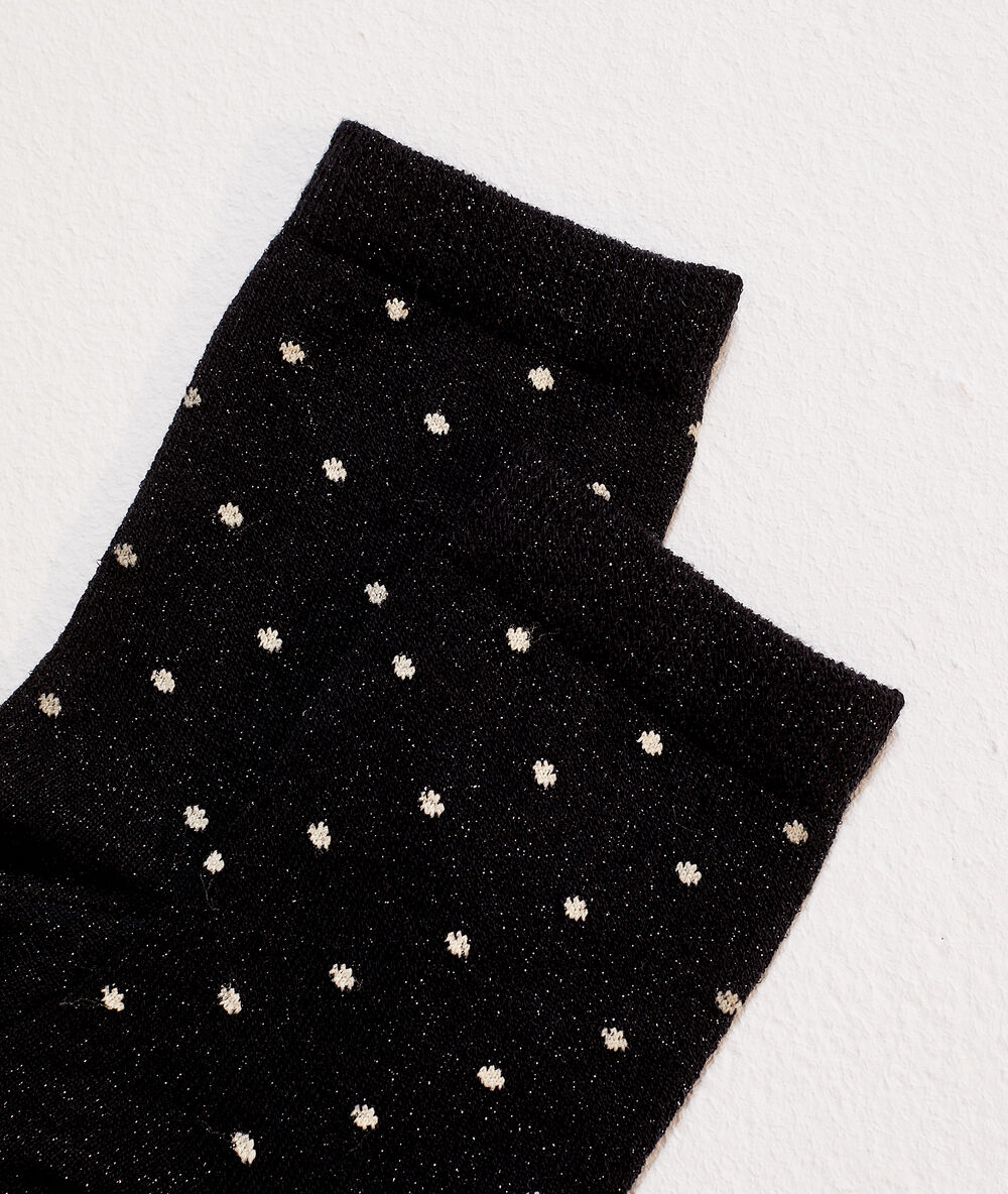 Calcetines estampado de lunares negro.